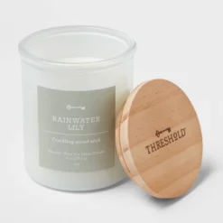 9oz Milky White Glass Woodwick Candle With Wood Lid And Stamped Logo Rainwater Lily - Threshold™ 5 9oz Milky White Glass Woodwick Candle With Wood Lid And Stamped Logo Rainwater Lily - Threshold™ -Selected Home Furnishings Store GUEST 4d79ad99 bd6e 4245 8b1a 472320536b1d